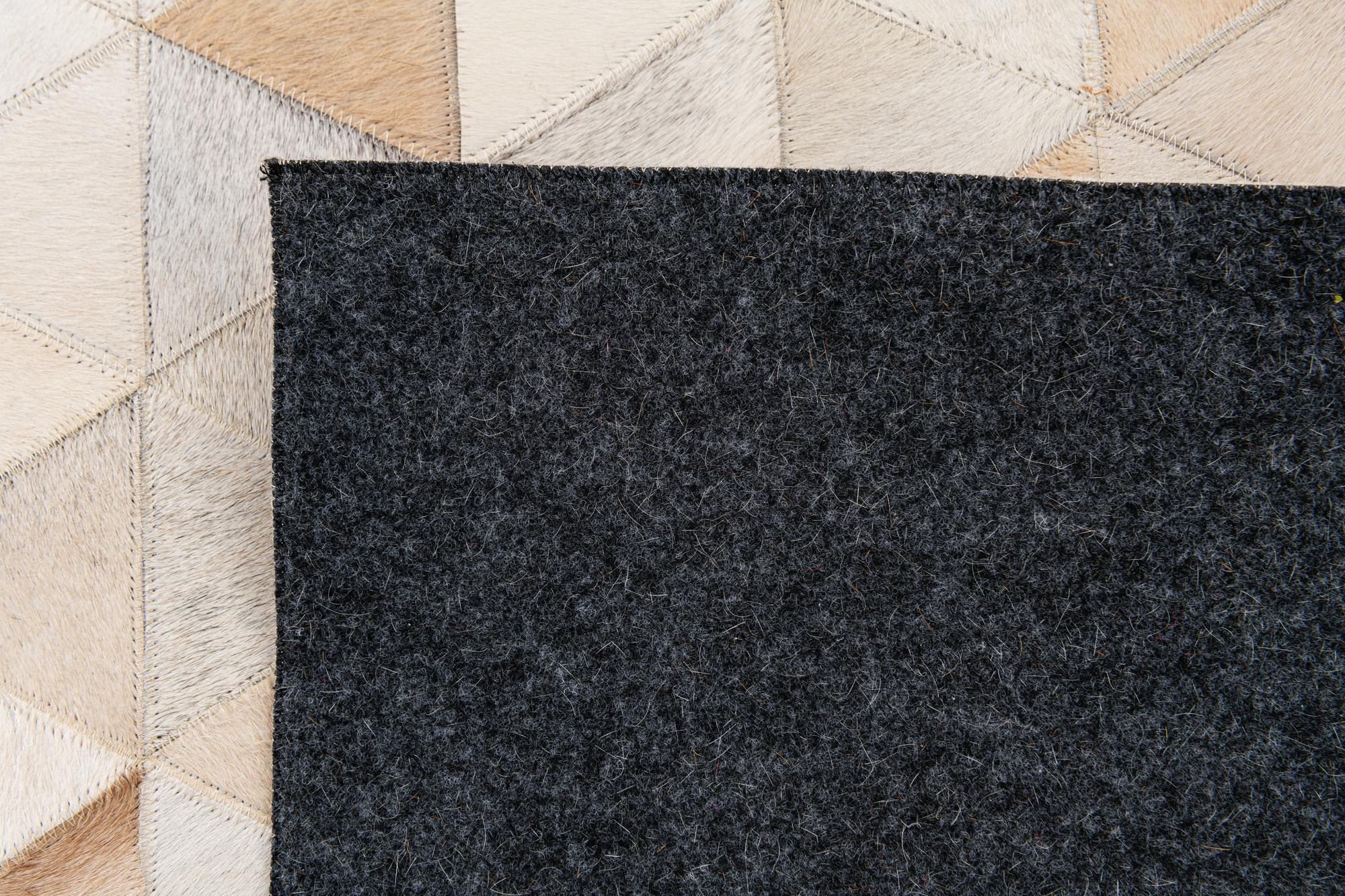 5' 1 x 8' Cowhide Stocks Rug
