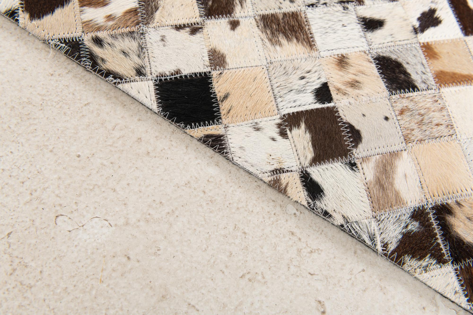 5' x 7' 11 Cowhide Stocks Rug