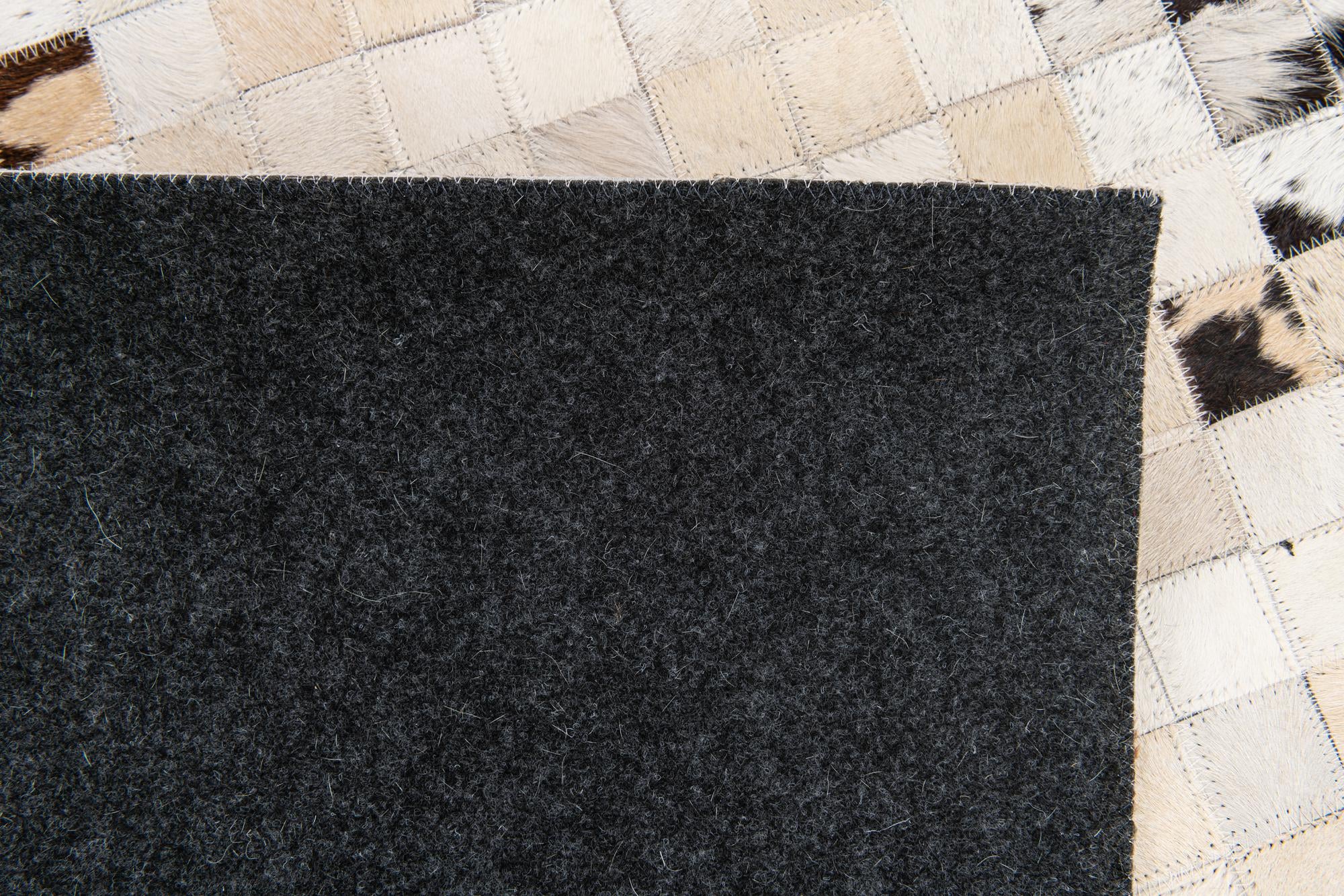 5' x 7' 11 Cowhide Stocks Rug
