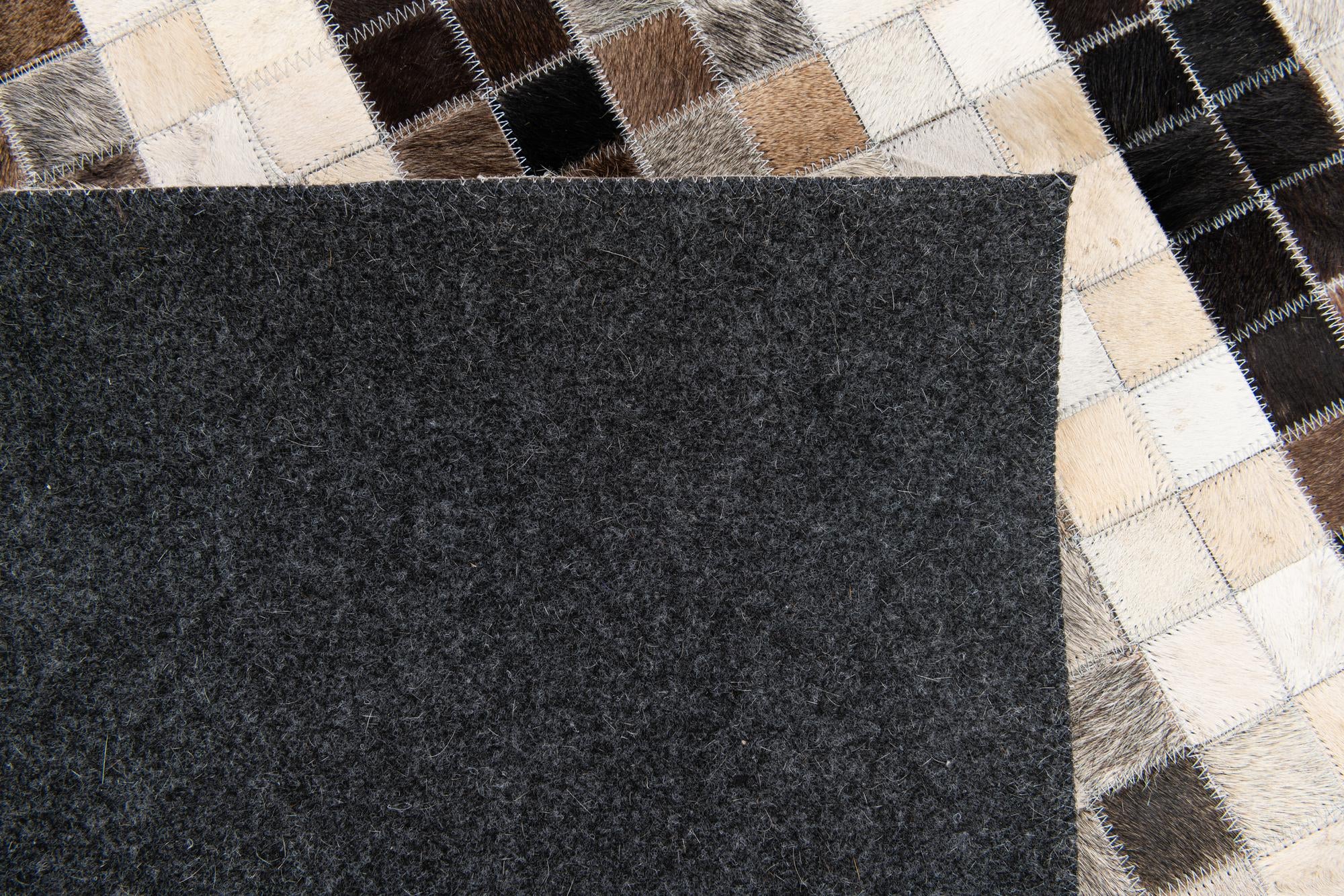 5' x 8' Cowhide Stocks Rug