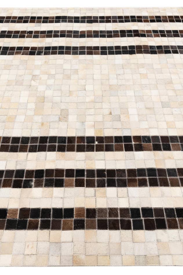 Detail image of 5' 1 x 7' 11 Cowhide Stocks Rug