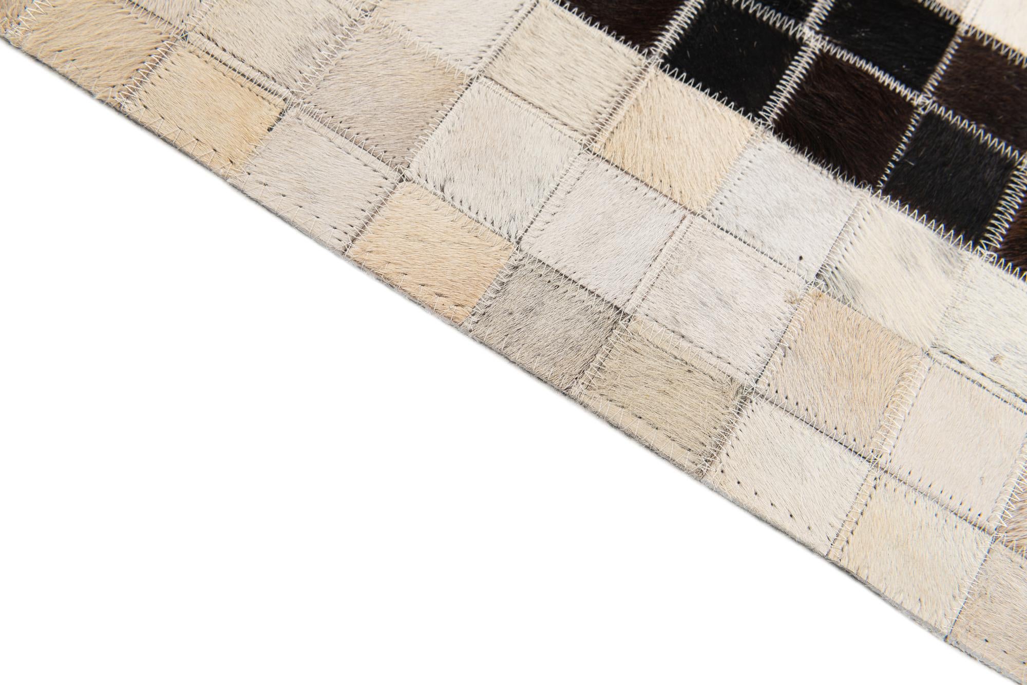 5' 1 x 7' 11 Cowhide Stocks Rug