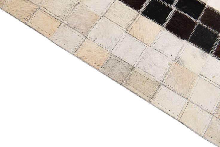 Detail image of 5' 1 x 7' 11 Cowhide Stocks Rug