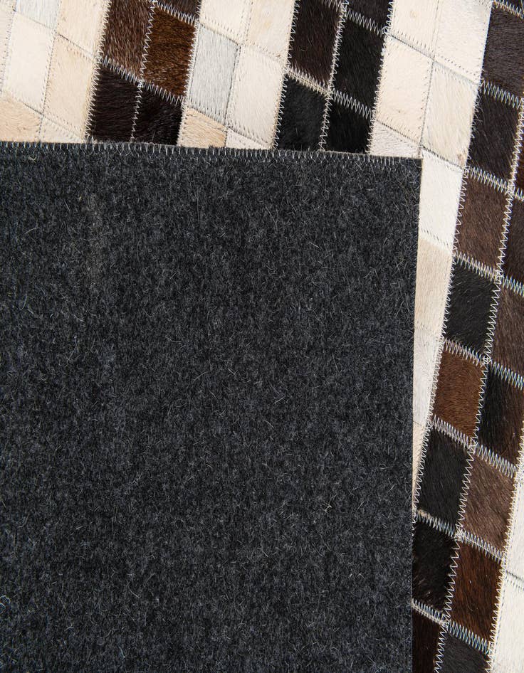 Detail image of 5' 1 x 7' 11 Cowhide Stocks Rug