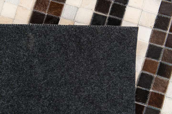 5' 1 x 7' 11 Cowhide Stocks Rug