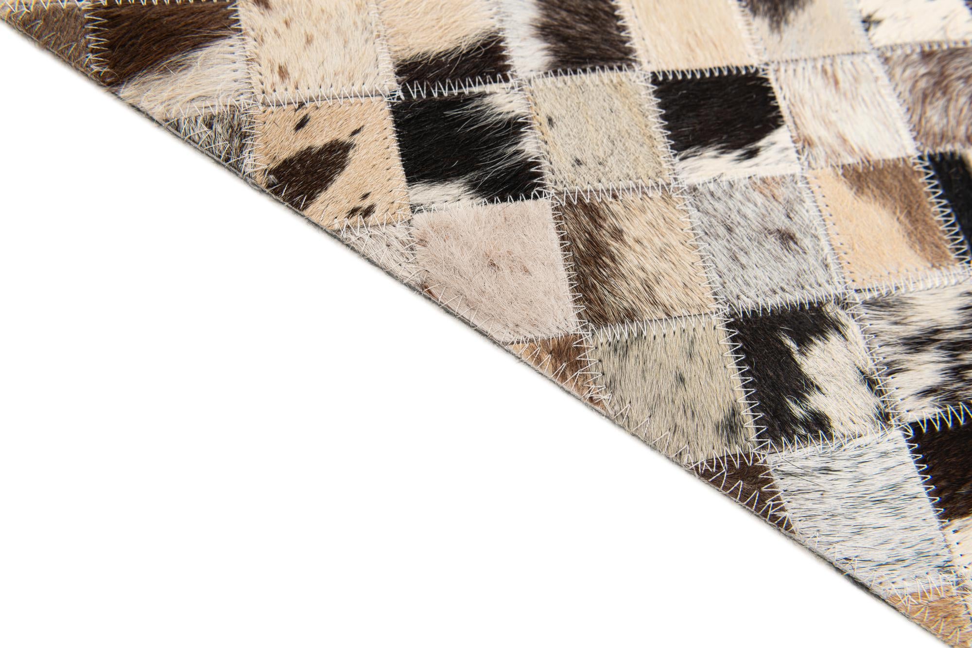 5' x 7' 10 Cowhide Stocks Rug