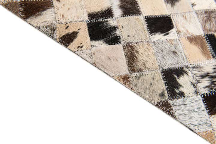 5' x 7' 10 Cowhide Stocks Rug