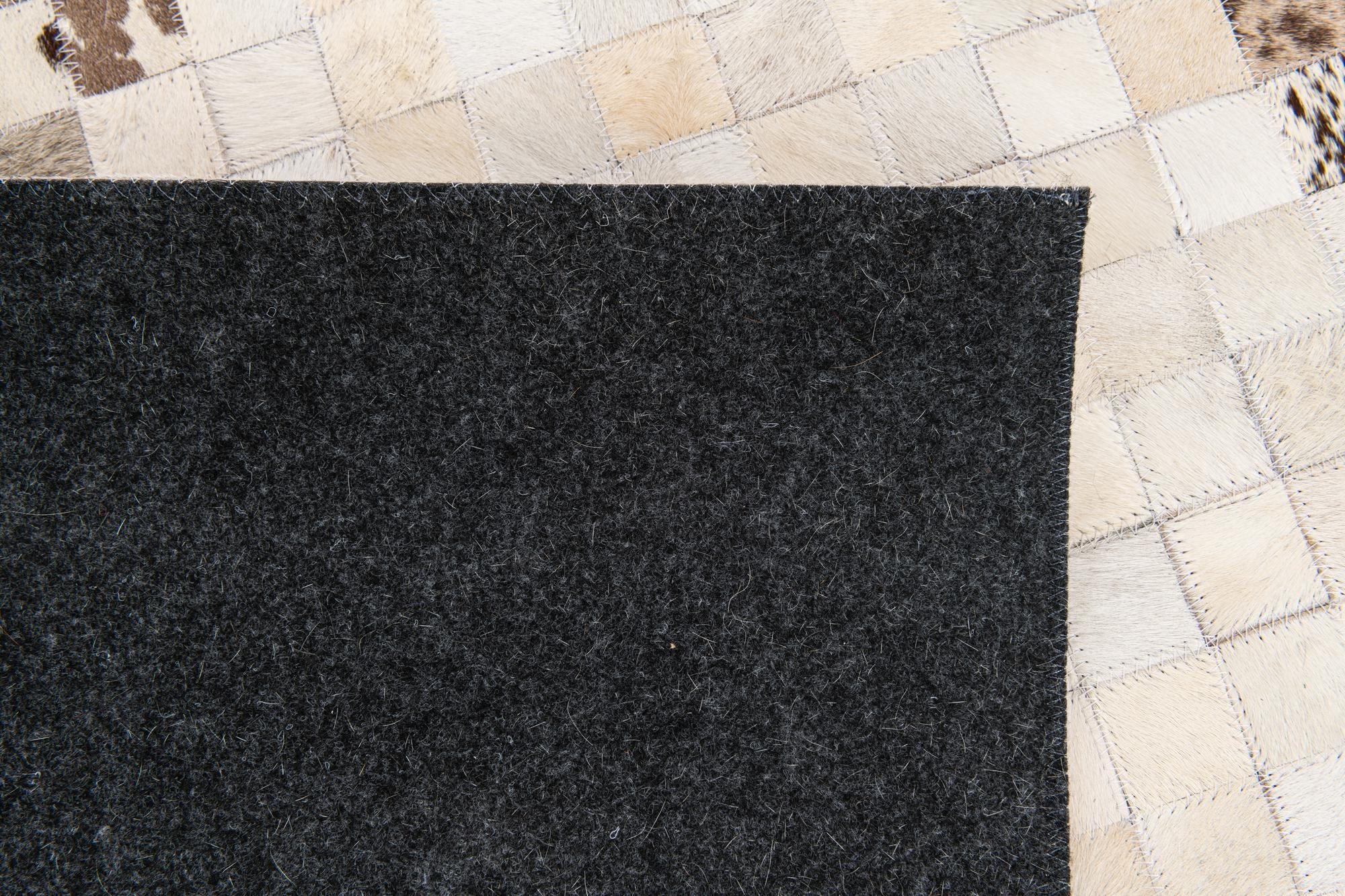 5' x 7' 11 Cowhide Stocks Rug