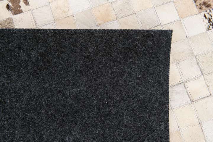 5' x 7' 11 Cowhide Stocks Rug