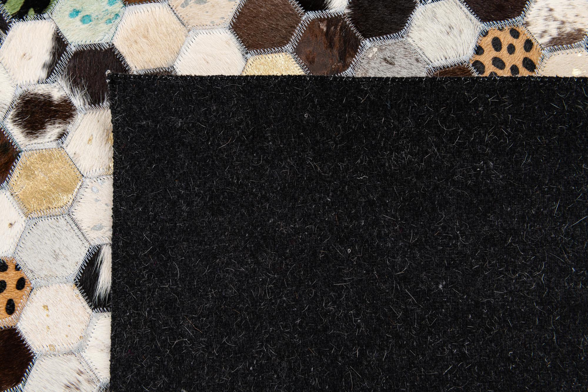 5' 1 x 8' Cowhide Stocks Rug