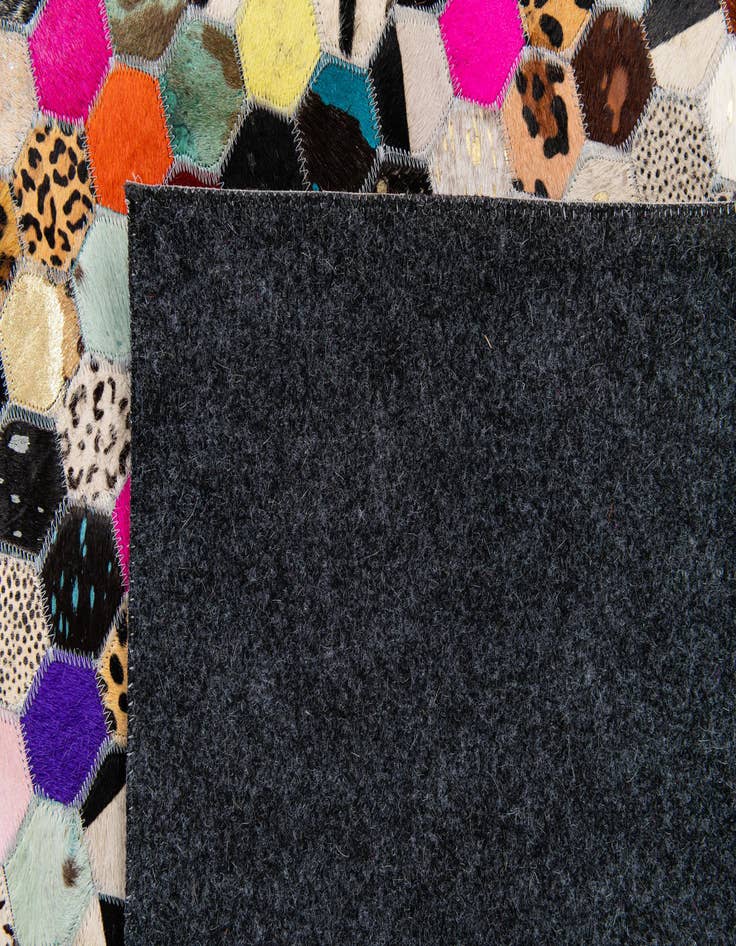 Detail image of 5' x 7' 11 Cowhide Stocks Rug