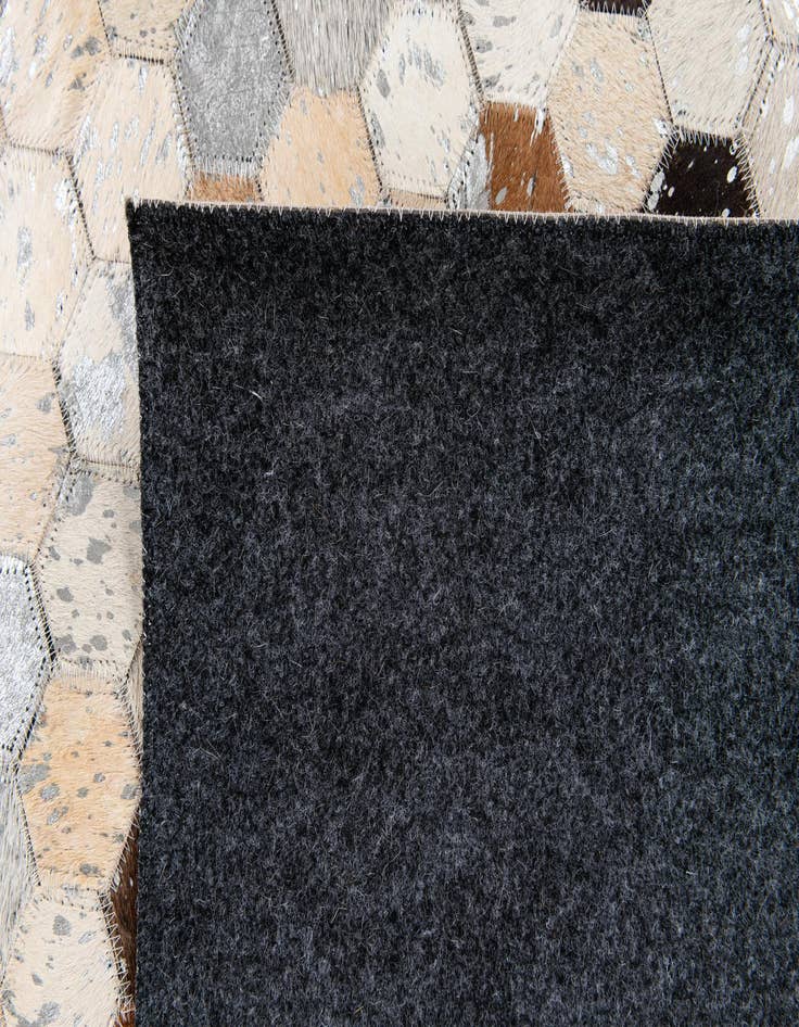 Detail image of 5' 2 x 7' 5 Cowhide Stocks Rug