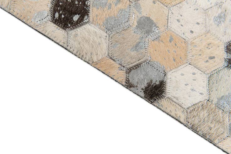 Detail image of 5' 1 x 8' 1 Cowhide Stocks Rug