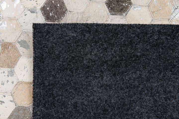5' 1 x 8' 1 Cowhide Stocks Rug