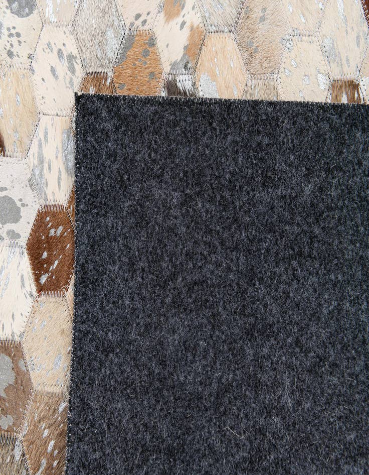 Detail image of 5' 4 x 7' 5 Cowhide Stocks Rug