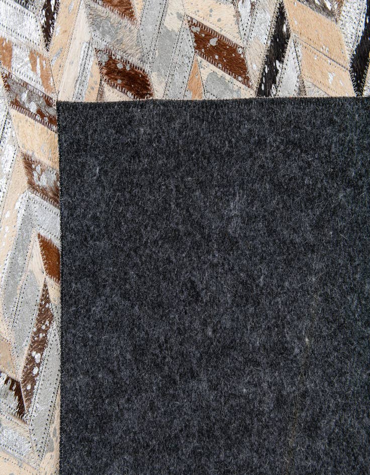 Detail image of 5' 2 x 8' Cowhide Stocks Rug