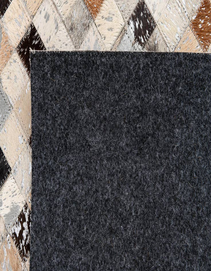 Detail image of 5' 5 x 7' 6 Cowhide Stocks Rug