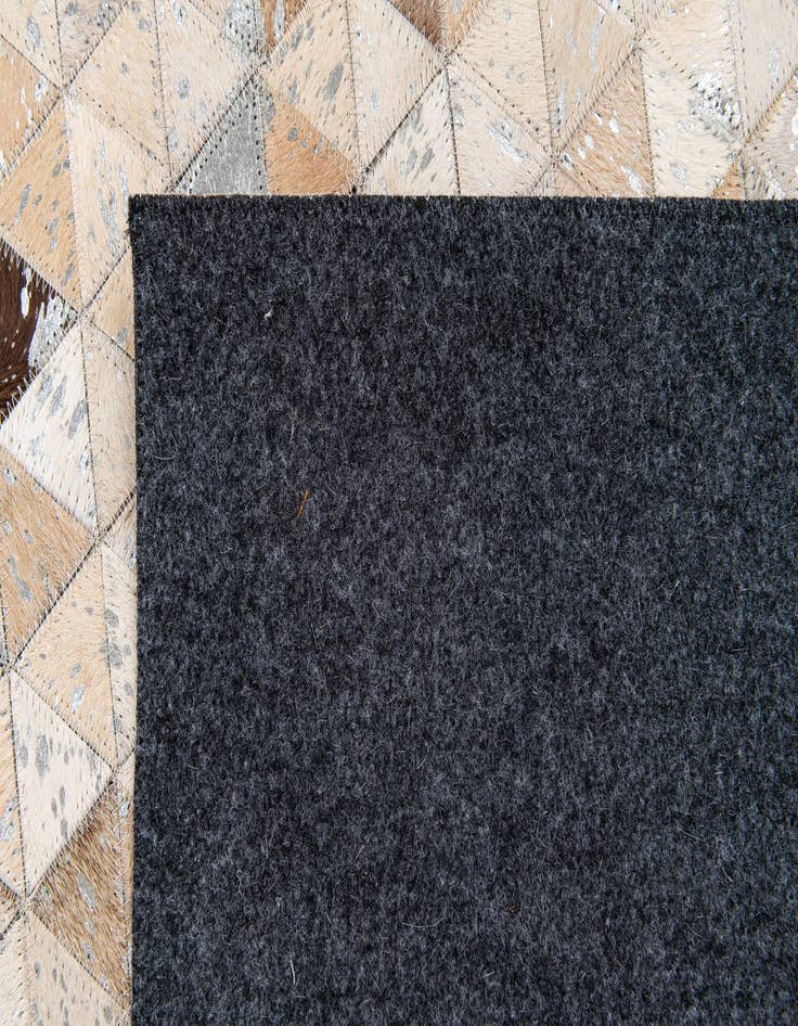 Detail image of 5' 4 x 7' 7 Cowhide Stocks Rug