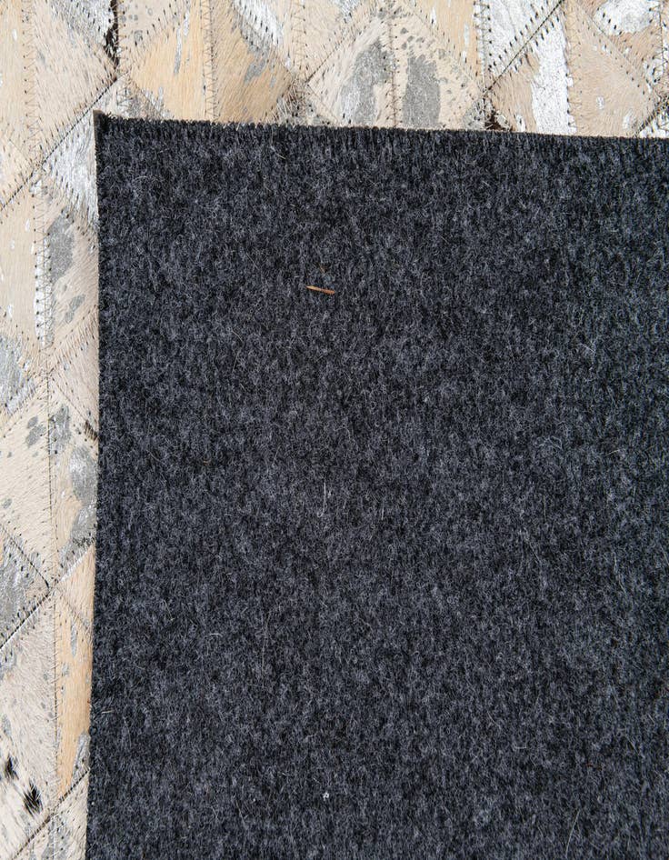 Detail image of 5' 3 x 7' 5 Cowhide Stocks Rug