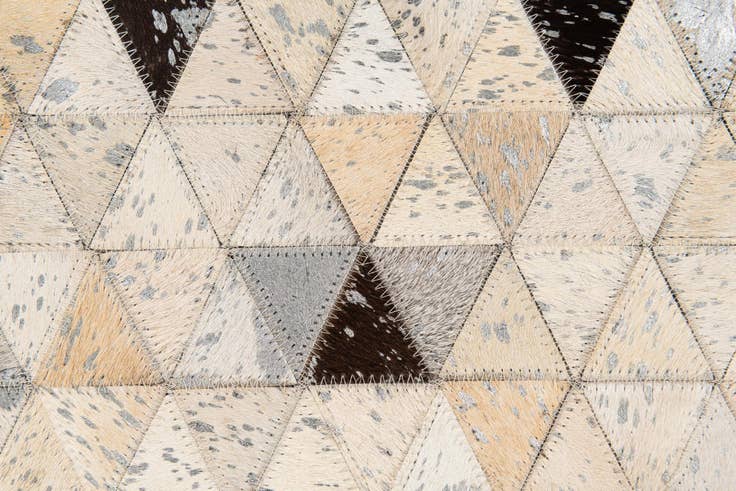 Detail image of 5' 3 x 7' 7 Cowhide Stocks Rug