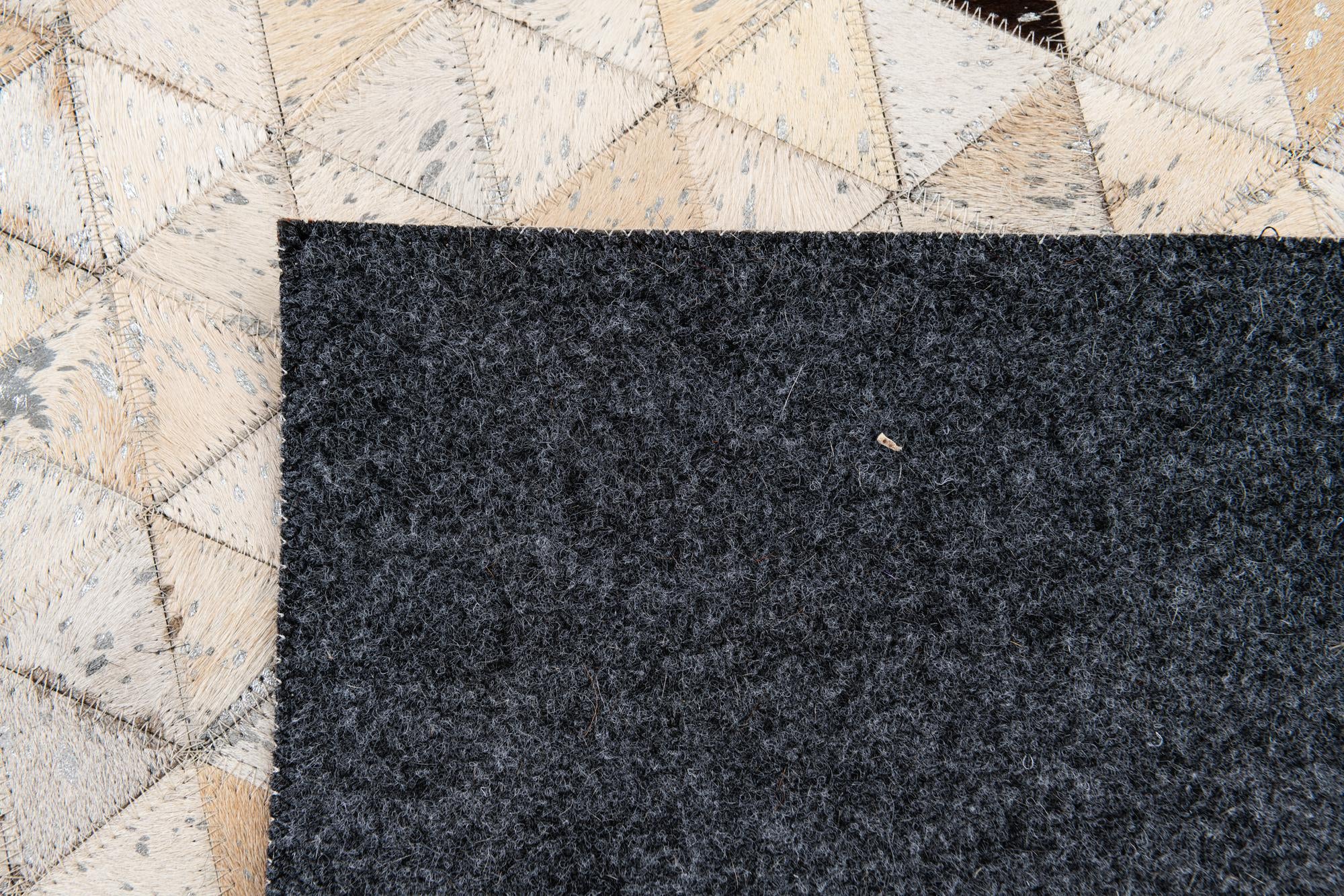 5' 3 x 7' 7 Cowhide Stocks Rug