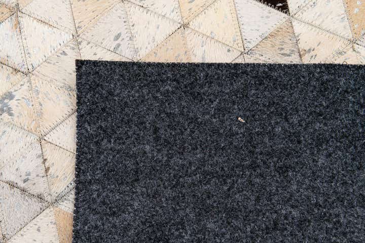 5' 3 x 7' 7 Cowhide Stocks Rug