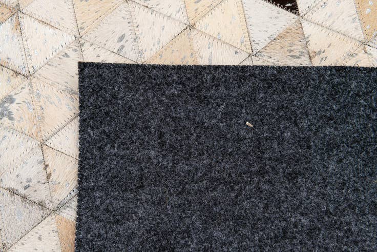 Detail image of 5' 3 x 7' 7 Cowhide Stocks Rug