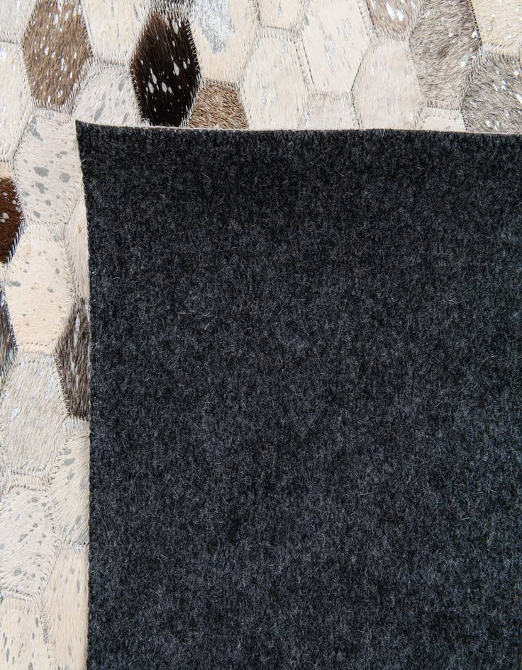 Detail image of 4' 11 x 7' 11 Cowhide Stocks Rug