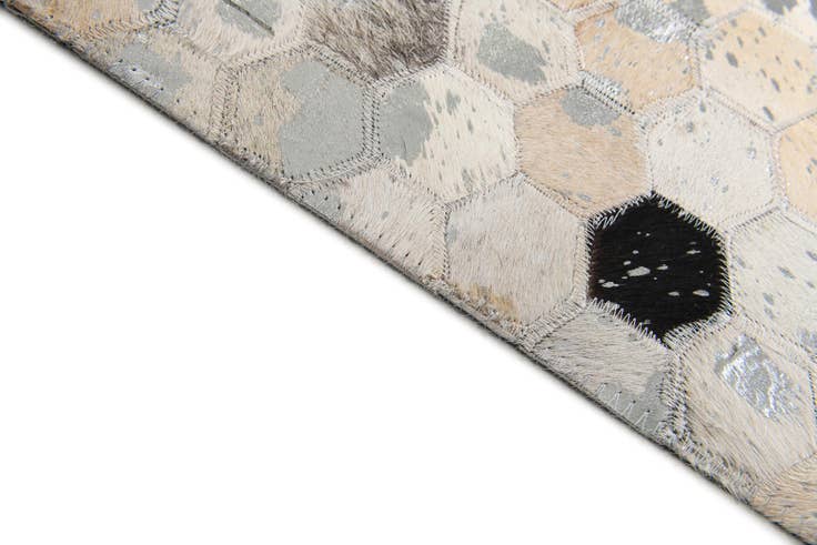 Detail image of 5' 1 x 8' Cowhide Stocks Rug
