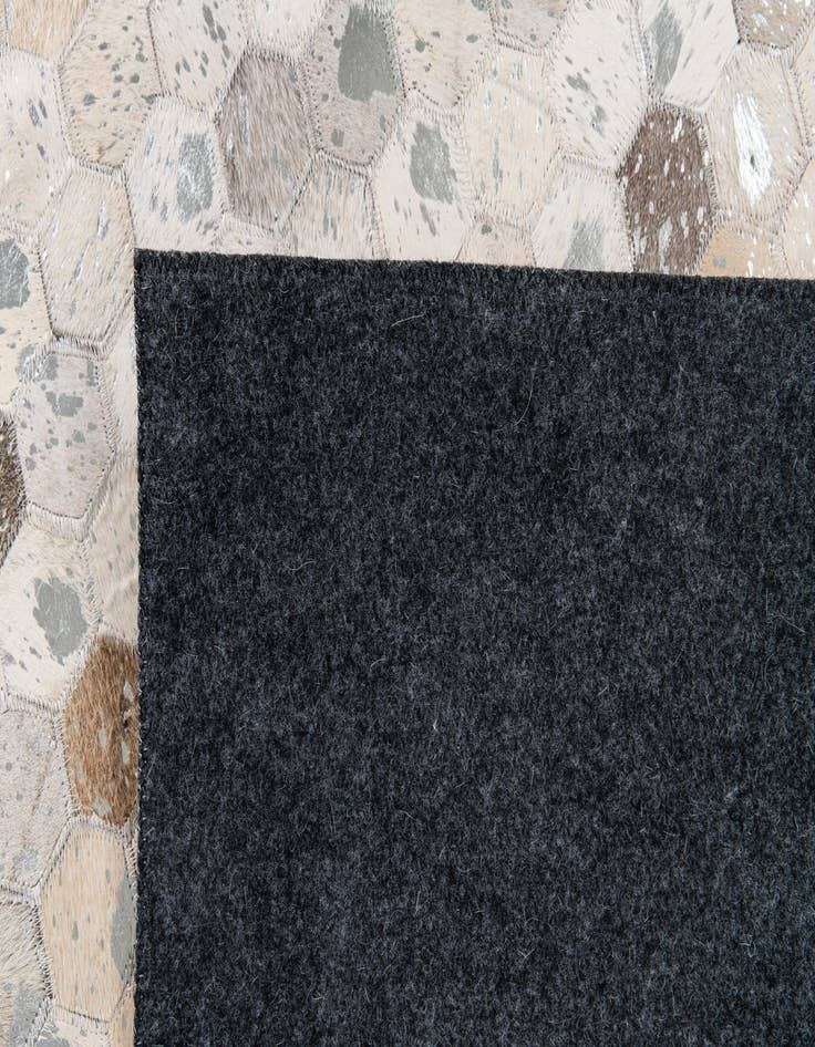 Detail image of 5' 1 x 8' Cowhide Stocks Rug