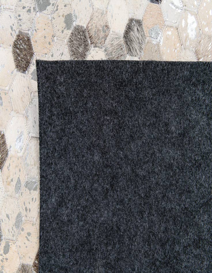 Detail image of 5' 1 x 8' Cowhide Stocks Rug