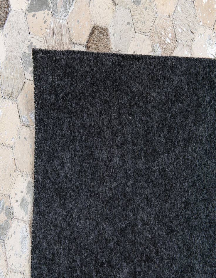Detail image of 5' 1 x 8' Cowhide Stocks Rug