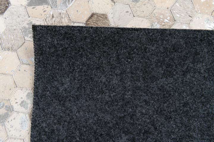 5' 1 x 8' Cowhide Stocks Rug