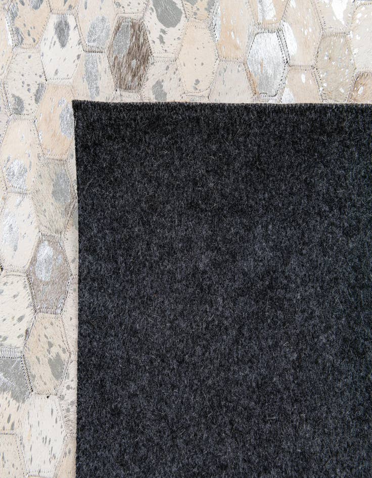 Detail image of 5' 1 x 8' Cowhide Stocks Rug