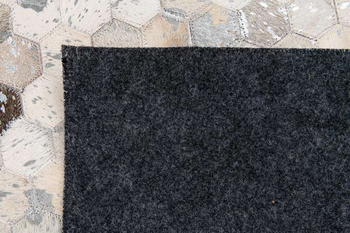 5' 1 x 8' 2 Cowhide Stocks Rug