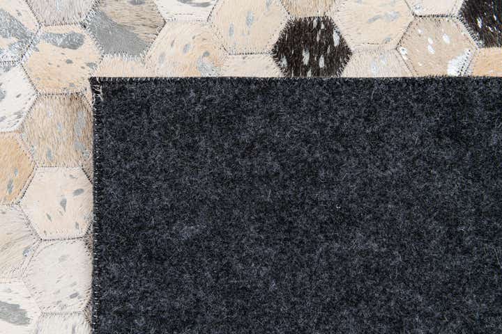 5' x 8' Cowhide Stocks Rug