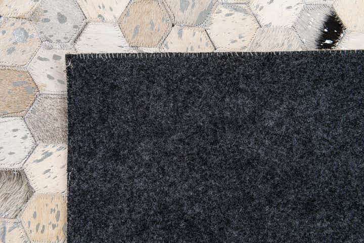 5' x 8' Cowhide Stocks Rug