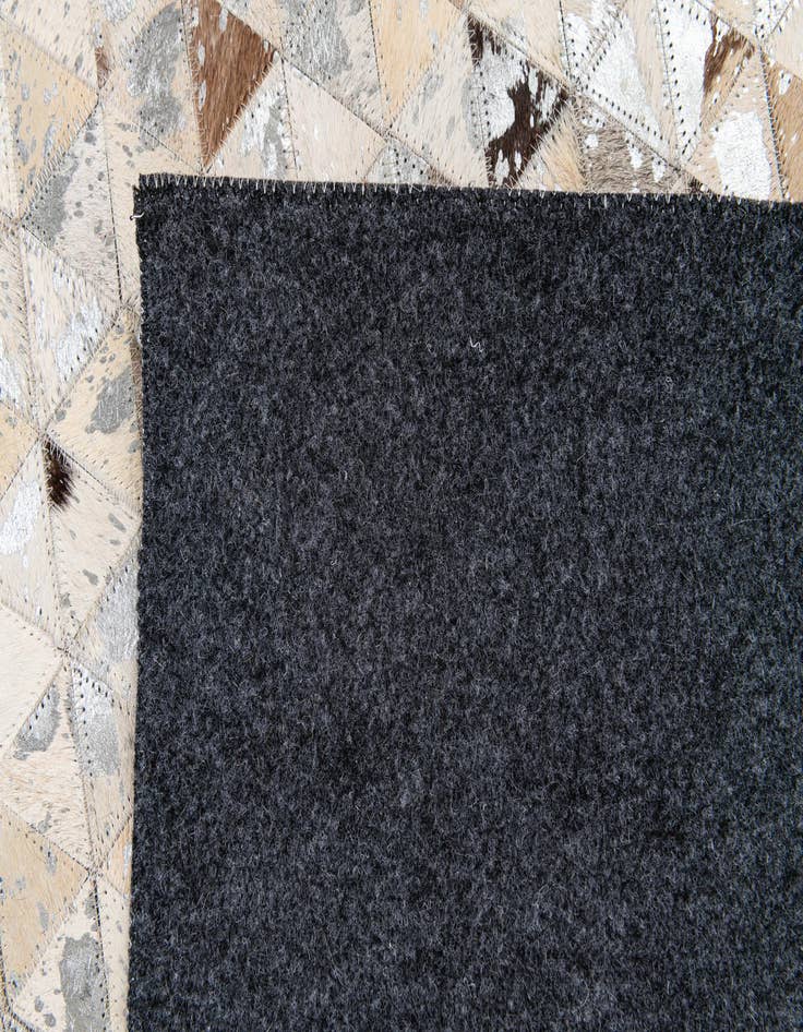 Detail image of 5' 4 x 7' 5 Cowhide Stocks Rug