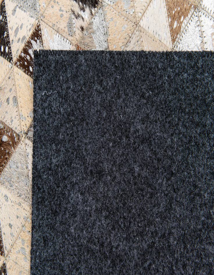 Detail image of 5' 4 x 7' 6 Cowhide Stocks Rug