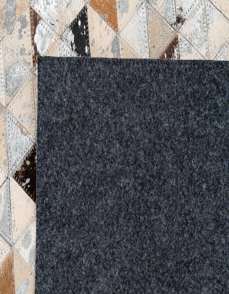 Detail image of 5' 3 x 7' 7 Cowhide Stocks Rug