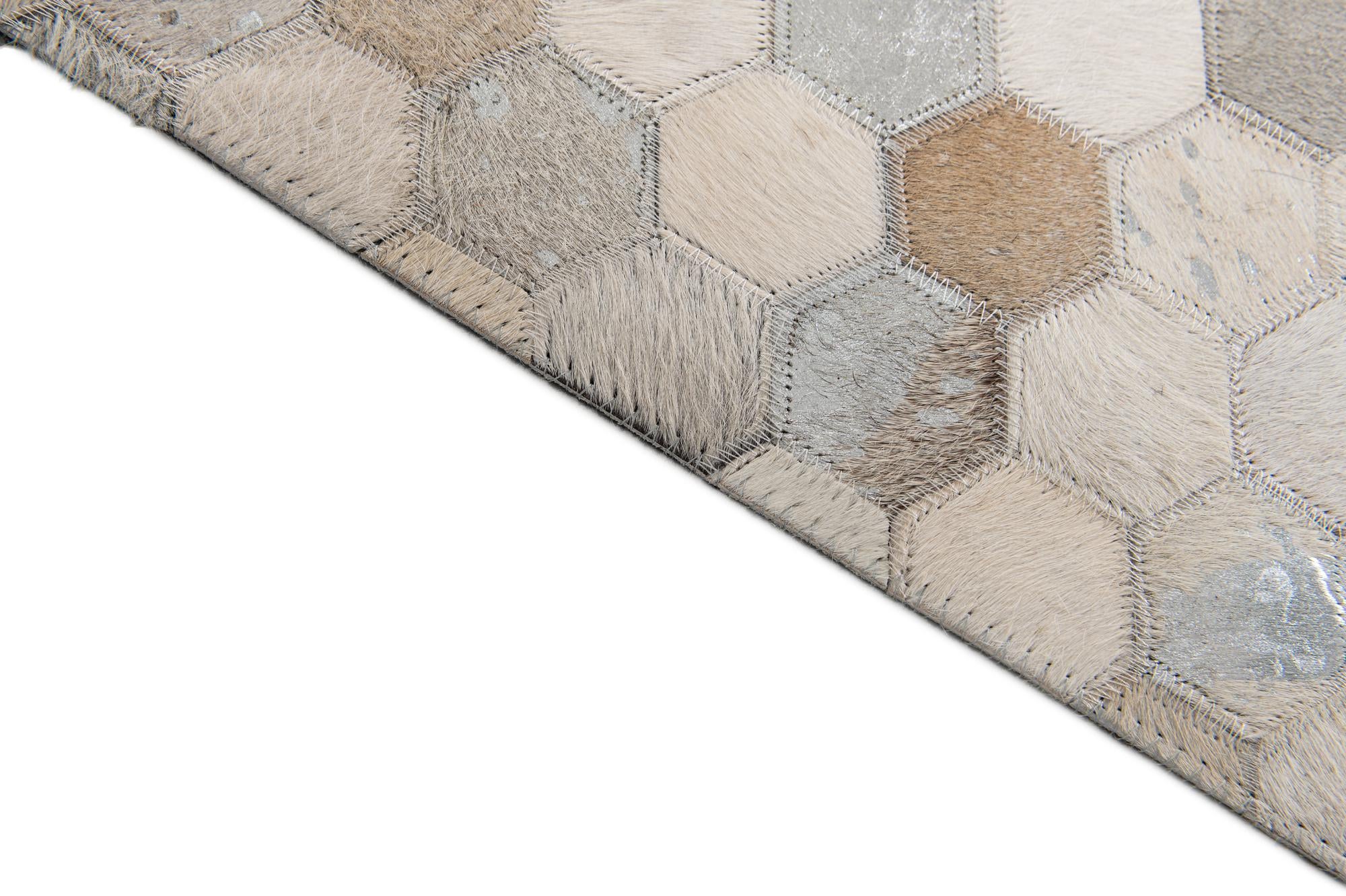 5' x 7' 11 Cowhide Stocks Rug