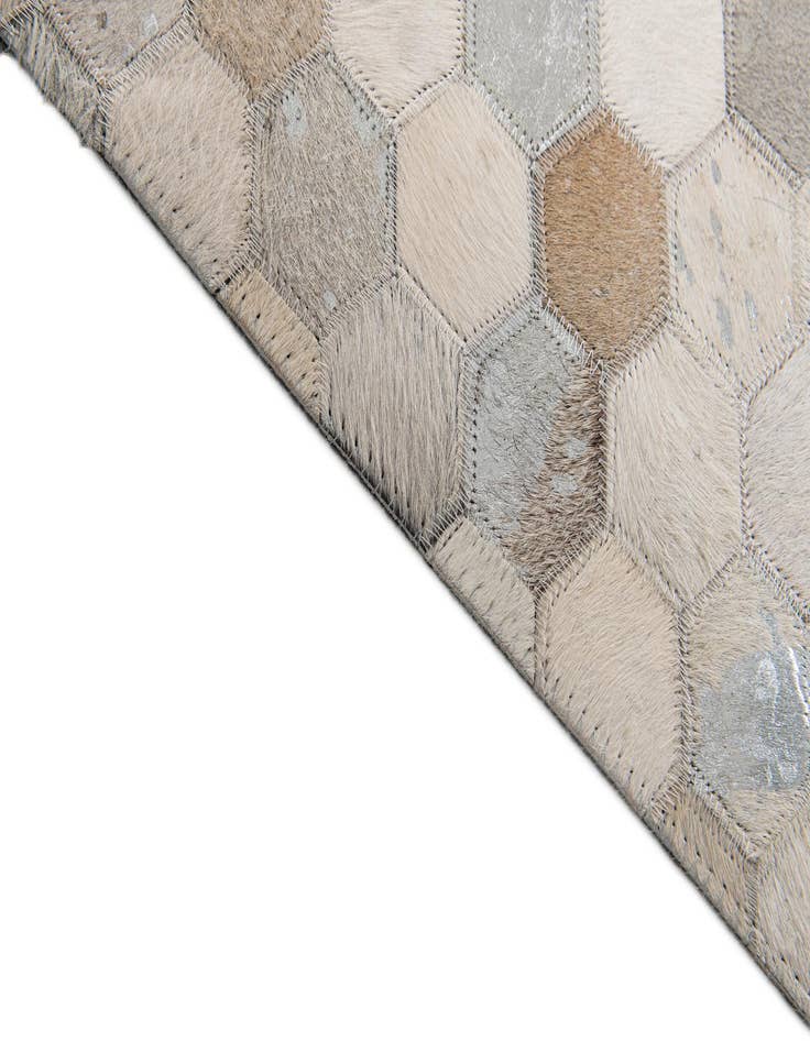 Detail image of 5' x 7' 11 Cowhide Stocks Rug