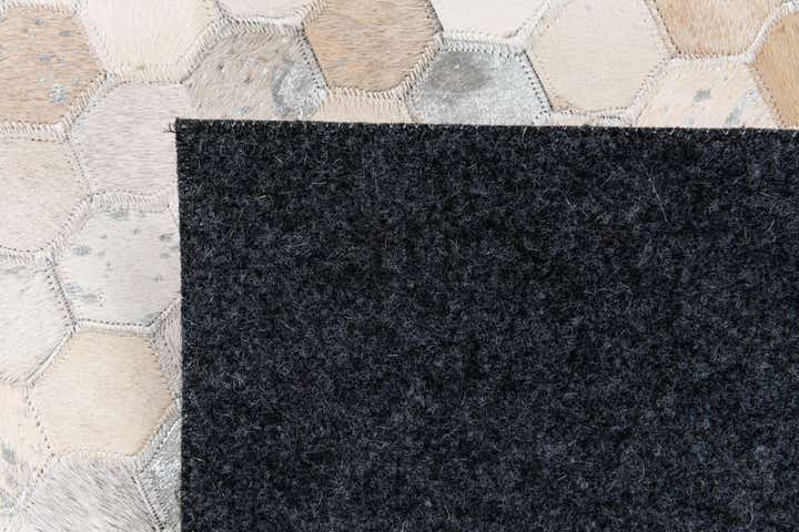 5' x 7' 11 Cowhide Stocks Rug