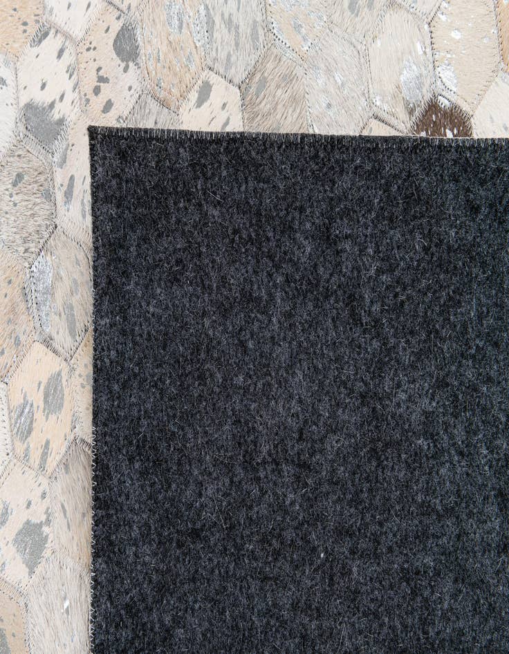 Detail image of 5' 1 x 8' Cowhide Stocks Rug