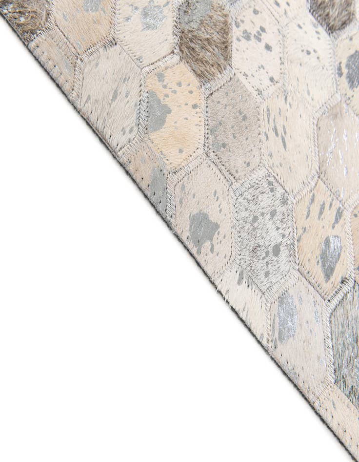 Detail image of 5' 1 x 8' 1 Cowhide Stocks Rug