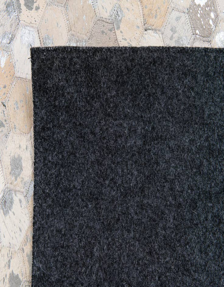 Detail image of 5' 1 x 8' 1 Cowhide Stocks Rug