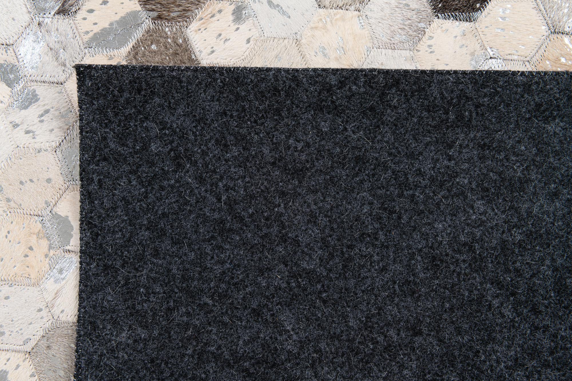 5' x 8' Cowhide Stocks Rug