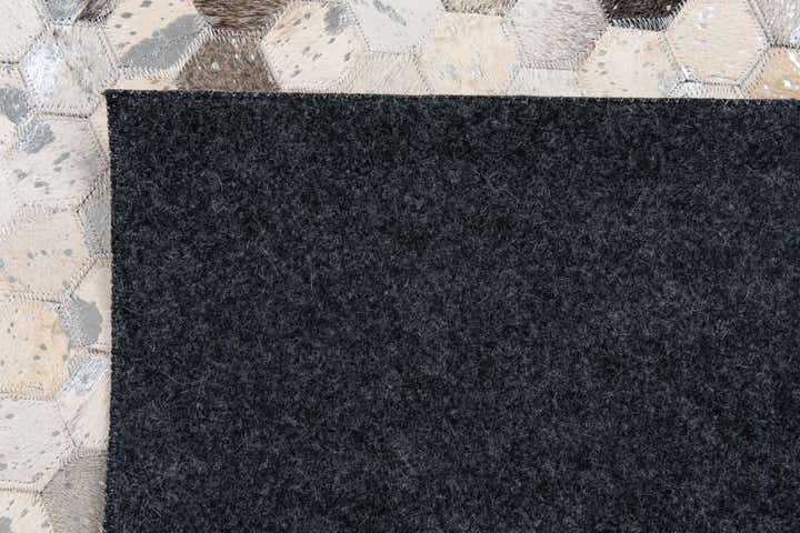 5' x 8' Cowhide Stocks Rug
