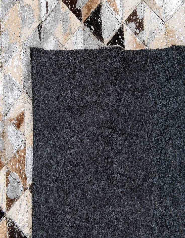 Detail image of 5' 3 x 7' 6 Cowhide Stocks Rug