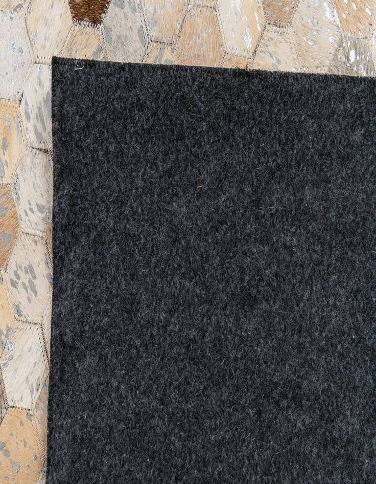 Detail image of 5' 4 x 7' 9 Cowhide Stocks Rug